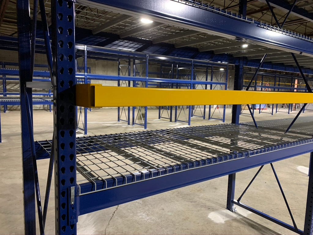 Speedrack Load Stop Beam Yellow on Blue Teardrop Pallet Rack